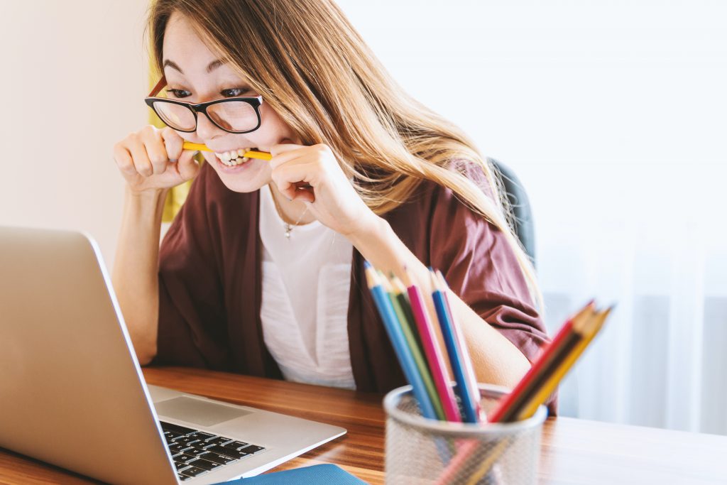 Frustrated person in front of computer